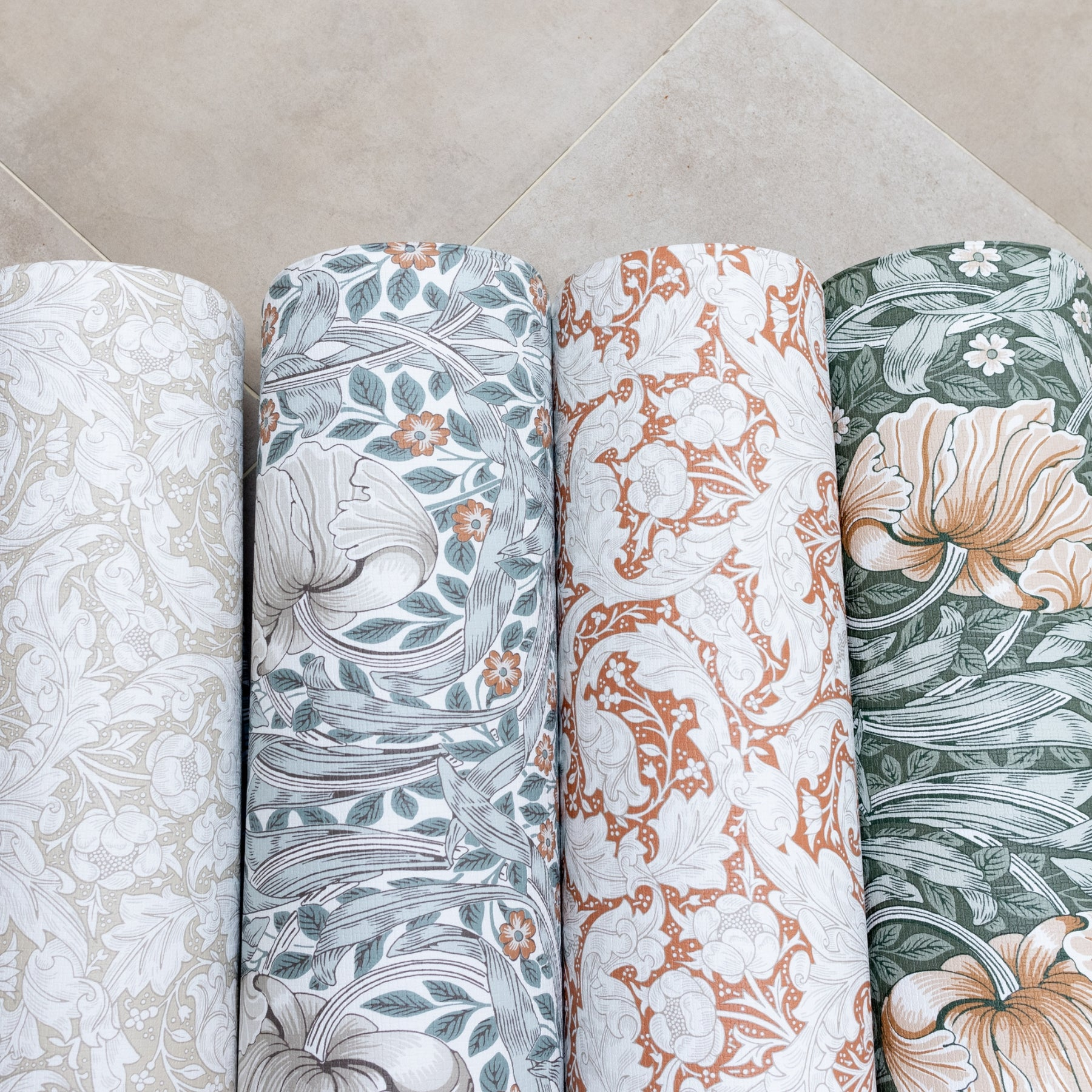 heritage and floral designs by Morris & Co. on soft baby playmats