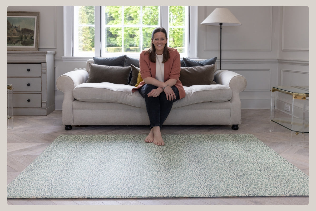 Susie Stubbs - founder of Totter + Tumble sites on a Willow Boughs Playmat