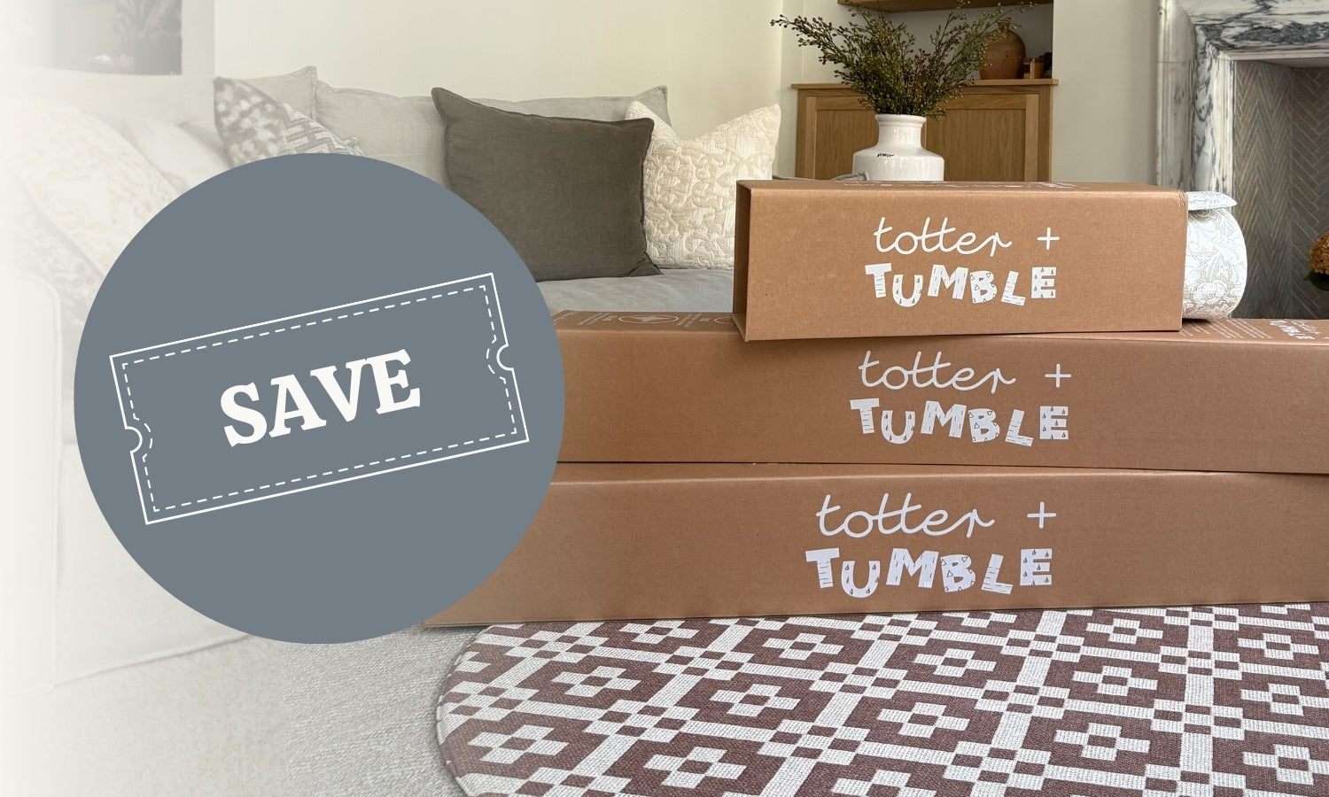 Three Totter + Tumble playmat boxes stacked on a patterned play rug with a 'SAVE' label overlay