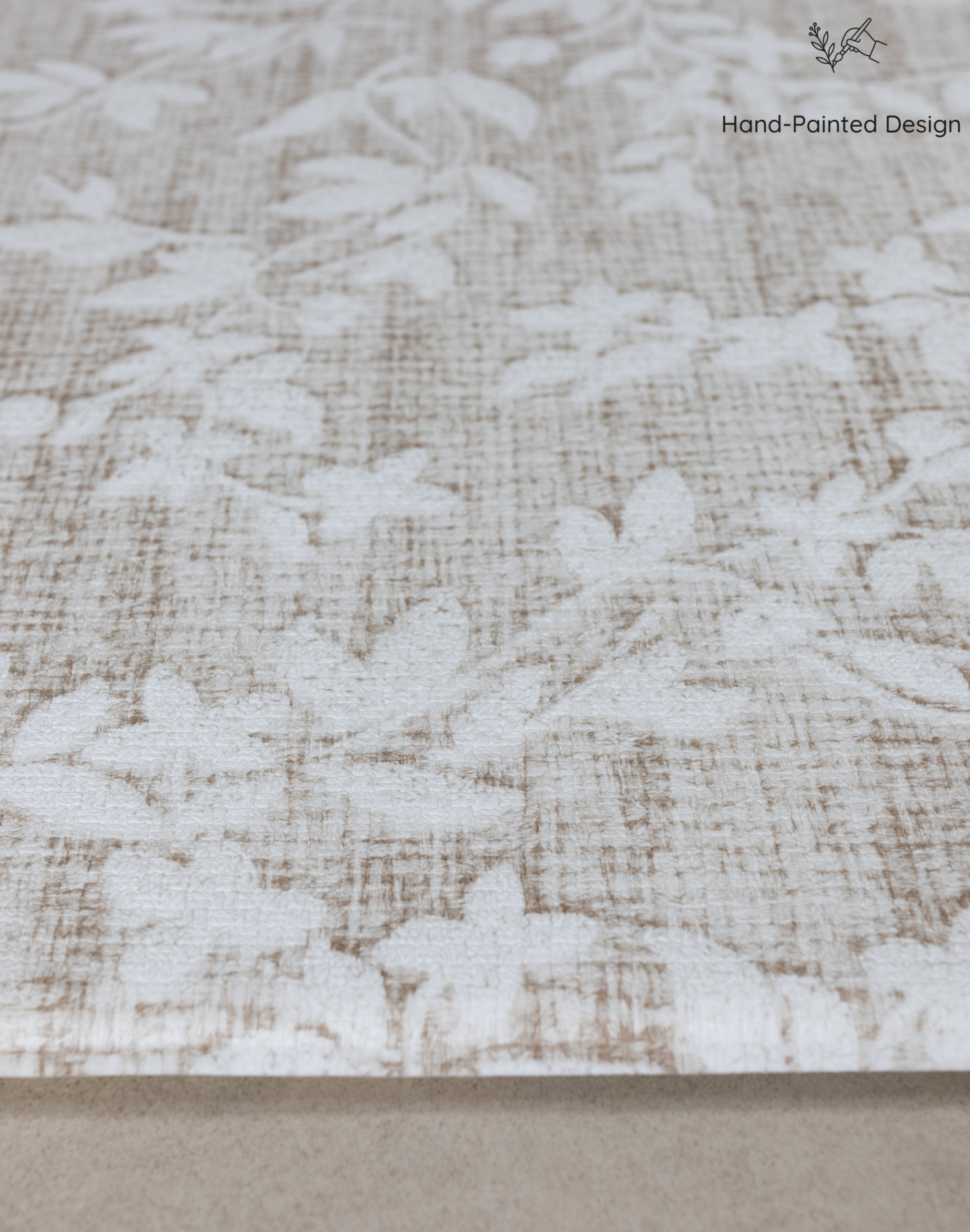 Close-up of neutral floral play mat 