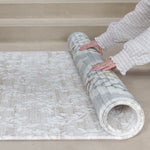 thick memory foam reversible play mat being rolled up