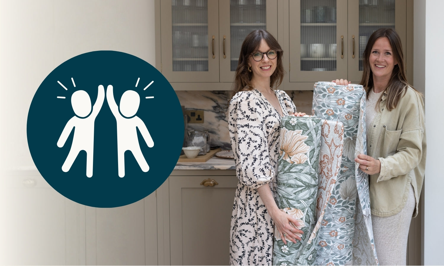 The Totter + Tumble team hold two floral William Morris play mats