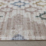 Close-up of a thick soft play mat with geometric pattern on a neutral background