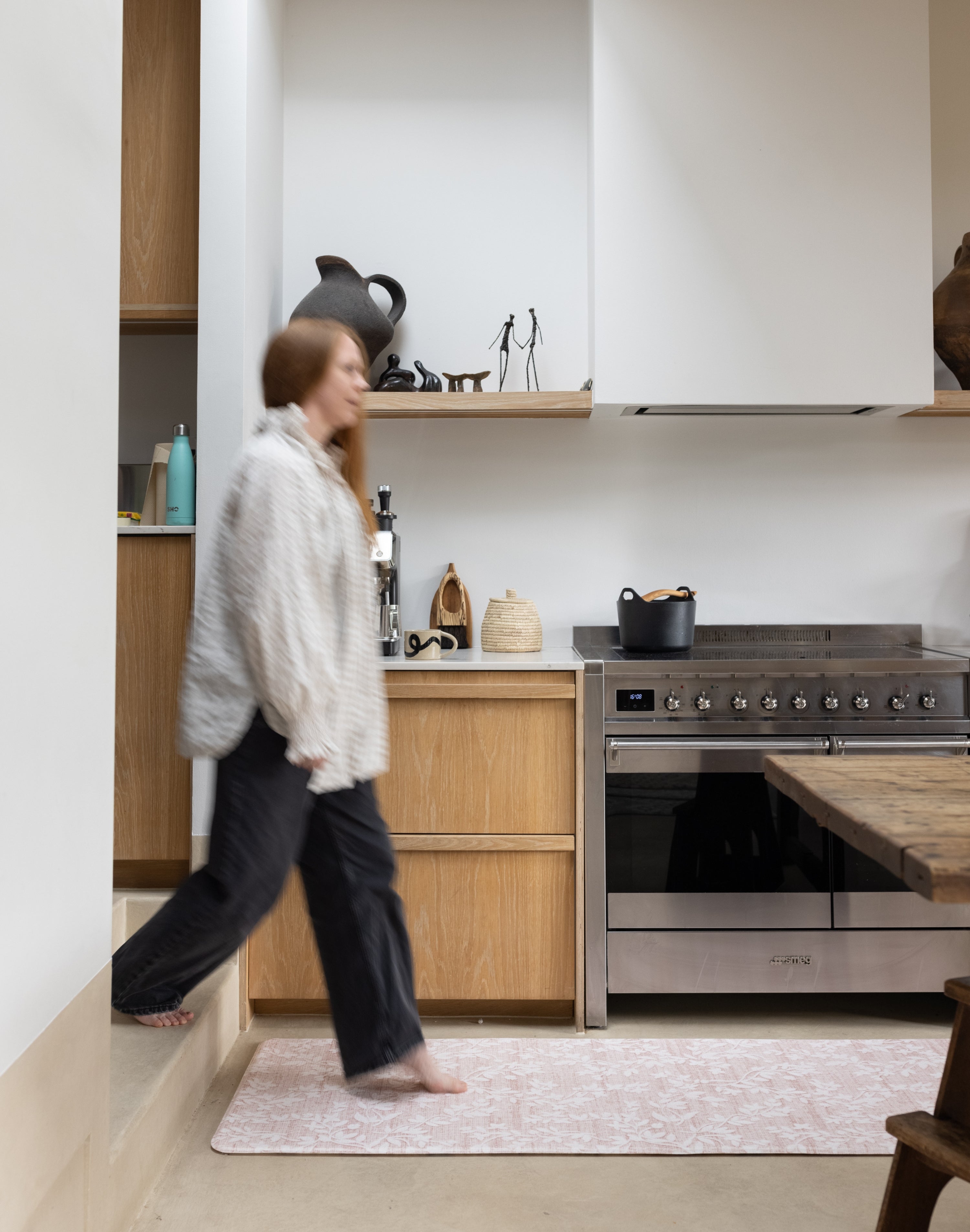 totter and tumble aster runner play mat in a kitchen