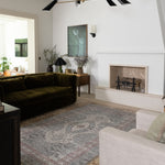 Totter + Tumble play mat rug adding comfort and style to a large family room.