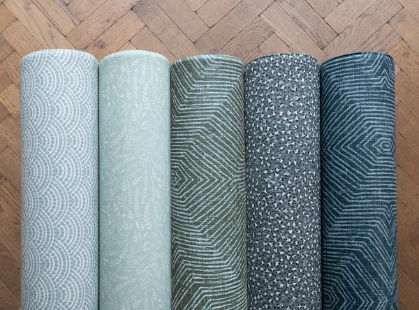 the greens and blues collection of stylish Totter + Tumble playmats