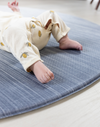 Close up of edge of playmat on Foam mats made for the whole family the navy play mat Kasuri by totter and tumble is perfect for stylish homes