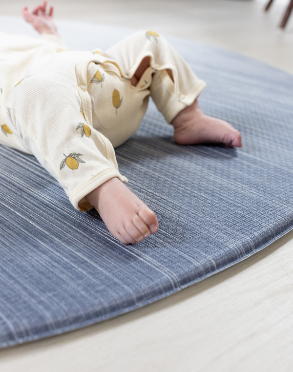 Close up of edge of playmat on Foam mats made for the whole family the navy play mat Kasuri by totter and tumble is perfect for stylish homes