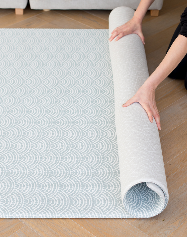 Unrolling simple one one play mat that is easy for family homes with beautiful scallop and chevron patterns