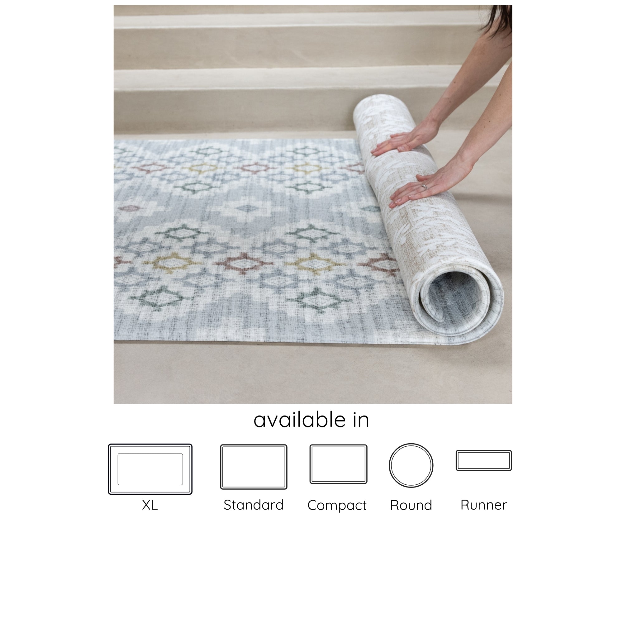 blue, neutral reversible geometric and floral play mat being rolled up, available in 5 sizes