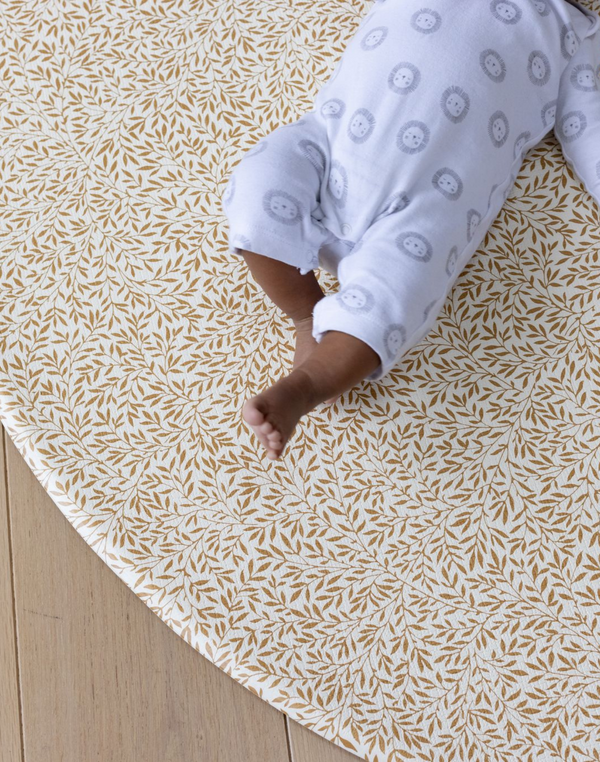 The Standen play mat totter + tumble morris & co collection in round size with baby floor mat, kid-friendly padded area rug that is comfortable, washable and easy to clean