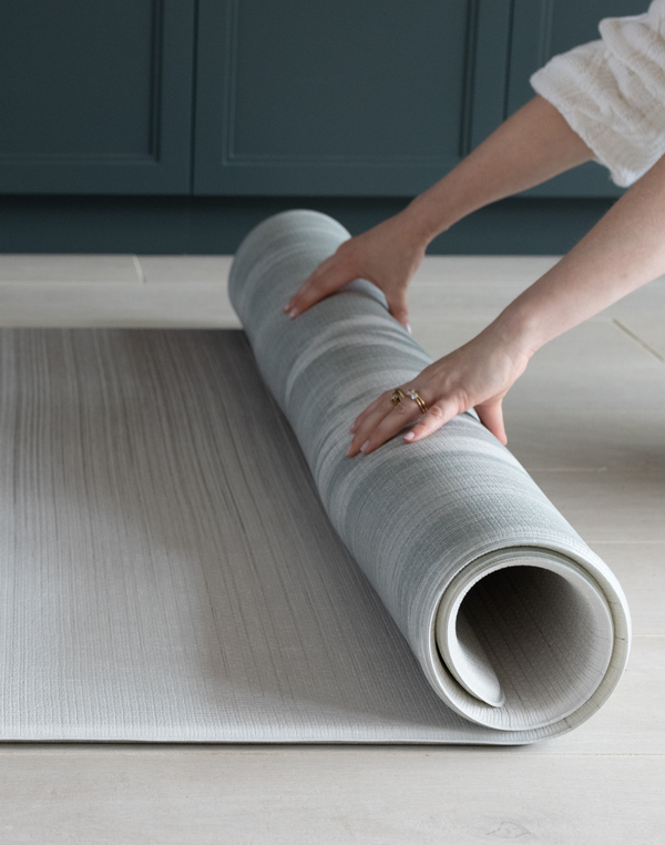 Unrolling the Foam mat made with quality materials and featuring neutral tan and beige design