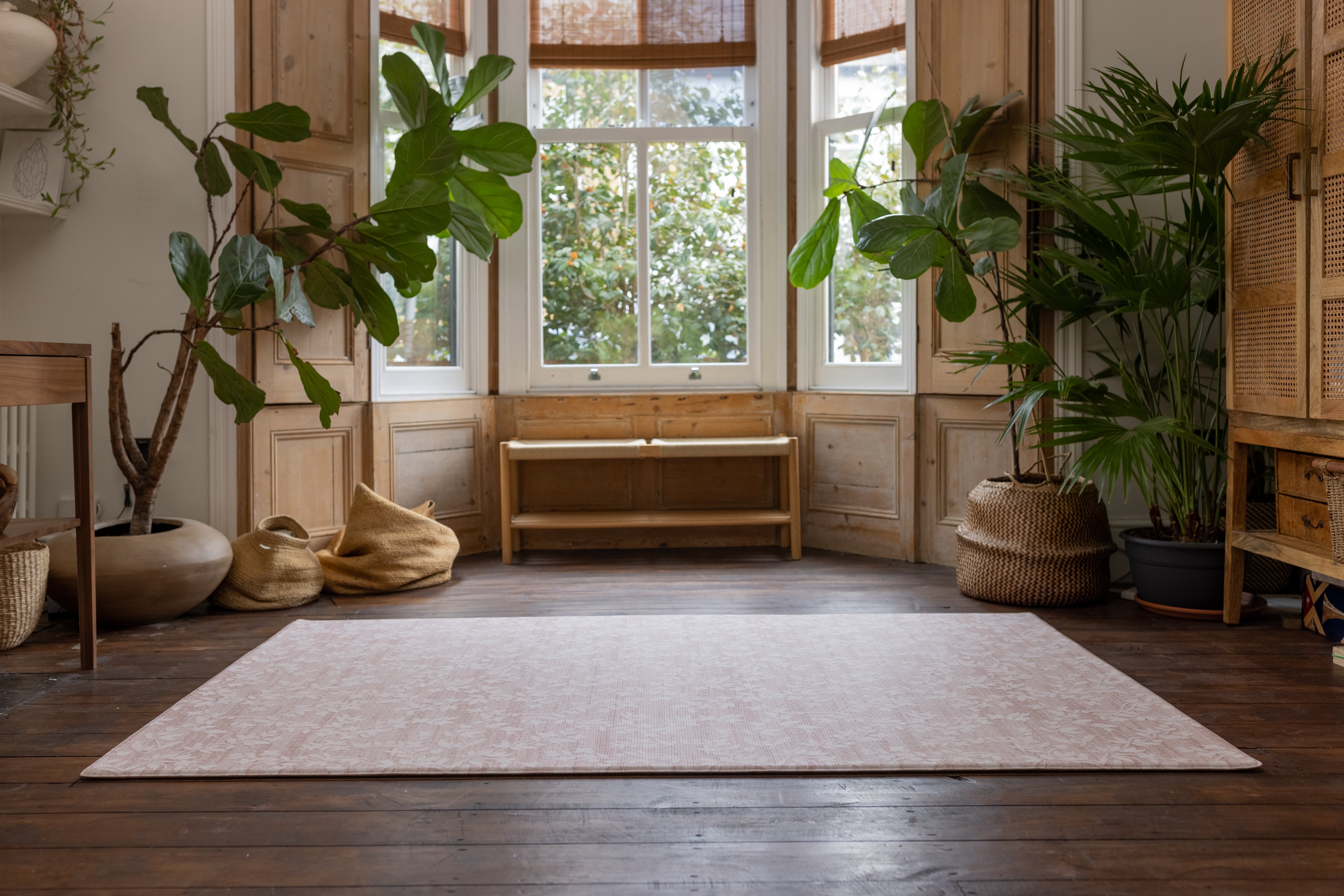 Reversible rug-like large floral play mat in a living room