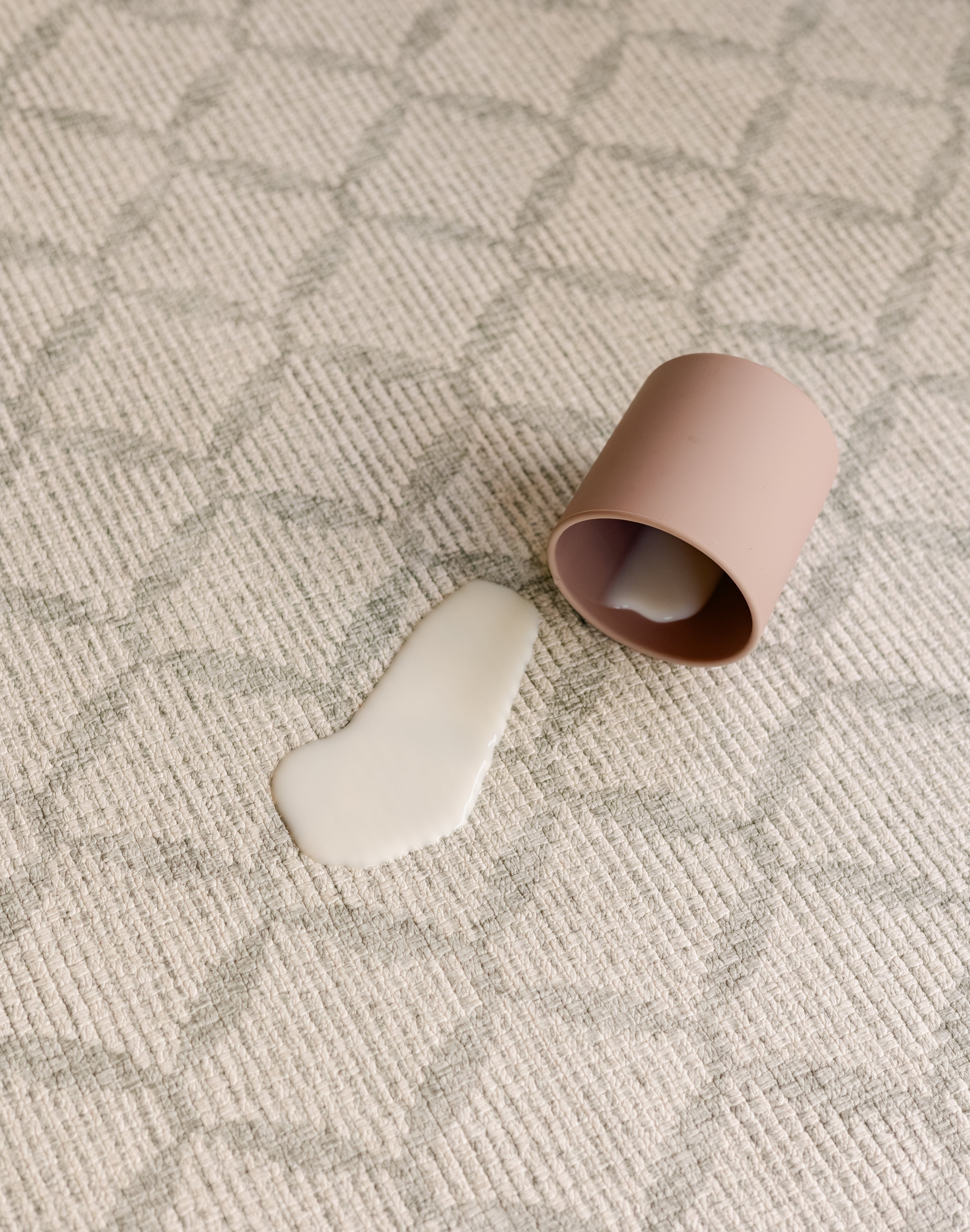 Spilt milk on the easy wipeable, safe, non toxic gatherer design play mat from totter and tumble | SKU: 26 BEACH/GATHER XL, 26 BEACH/GATHER STD, 26 BEACH/GATHER COMP