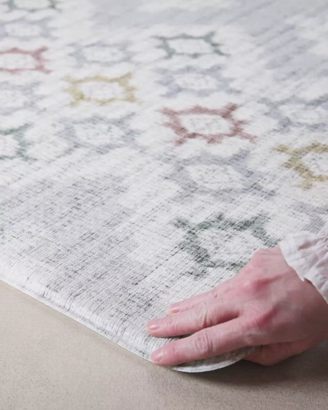 video showing geometric and floral reversible play mat in thick safe memory foam