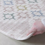 video showing geometric and floral reversible play mat in thick safe memory foam