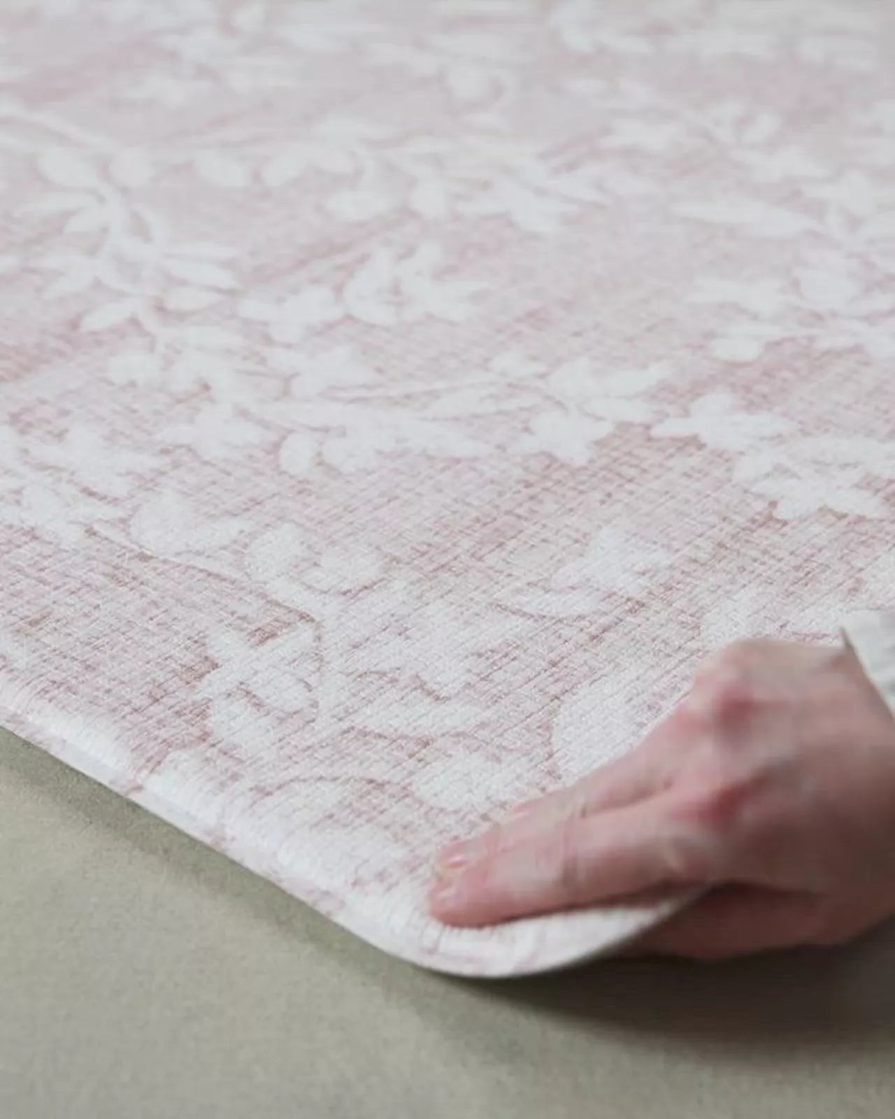 video showing geometric and floral reversible play mat in thick safe memory foam