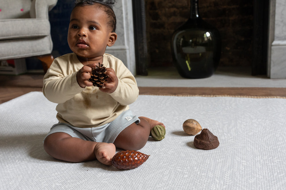 Baby on luxury one piece foam play mat stylish botanical grey playmat totter and tumble The Thinker