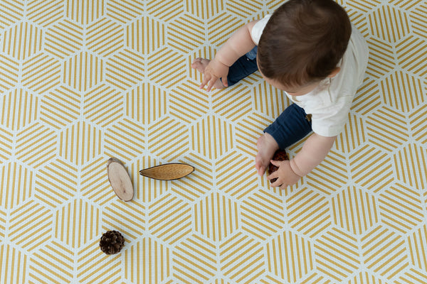 totter and tumble padded floor mat for the whole family in reversible designs wipedown